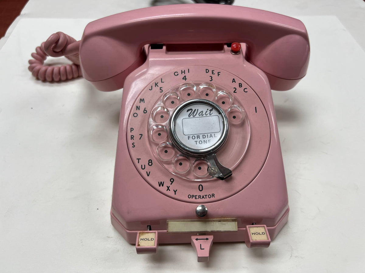 Vintage pink Stromberg-Carlson rotary 2-line key telephone