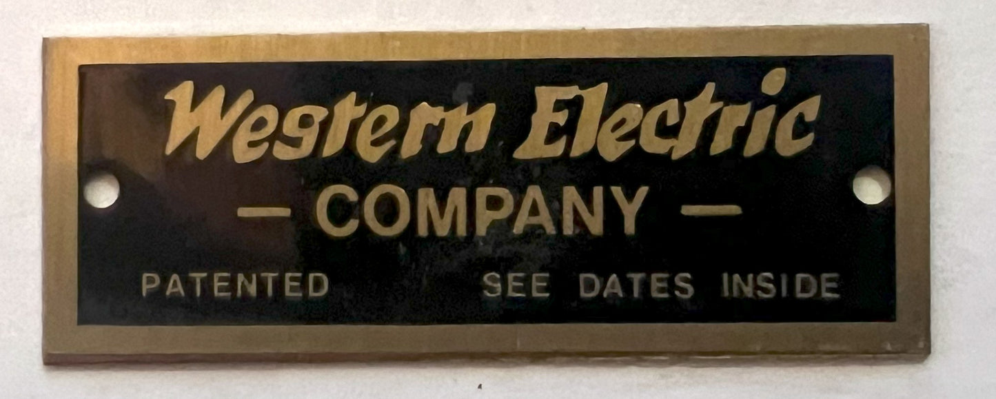 Brass Badge - Western Electric - Black Background - 3/4"x 2"