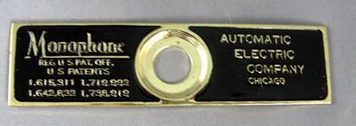Automatic Electric Reproduction Top cradle badge