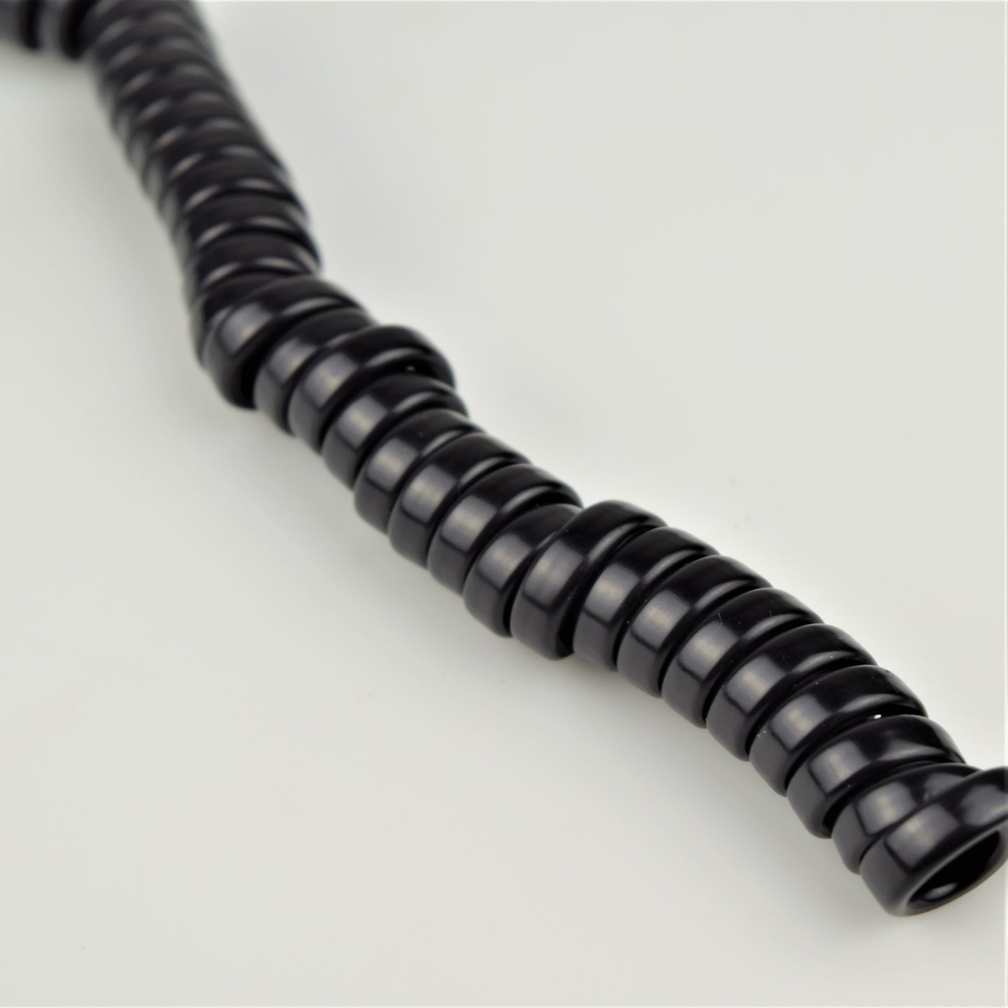 Cord - Handset - Black - flat - Curly - 4 Conductor - spade terminations.