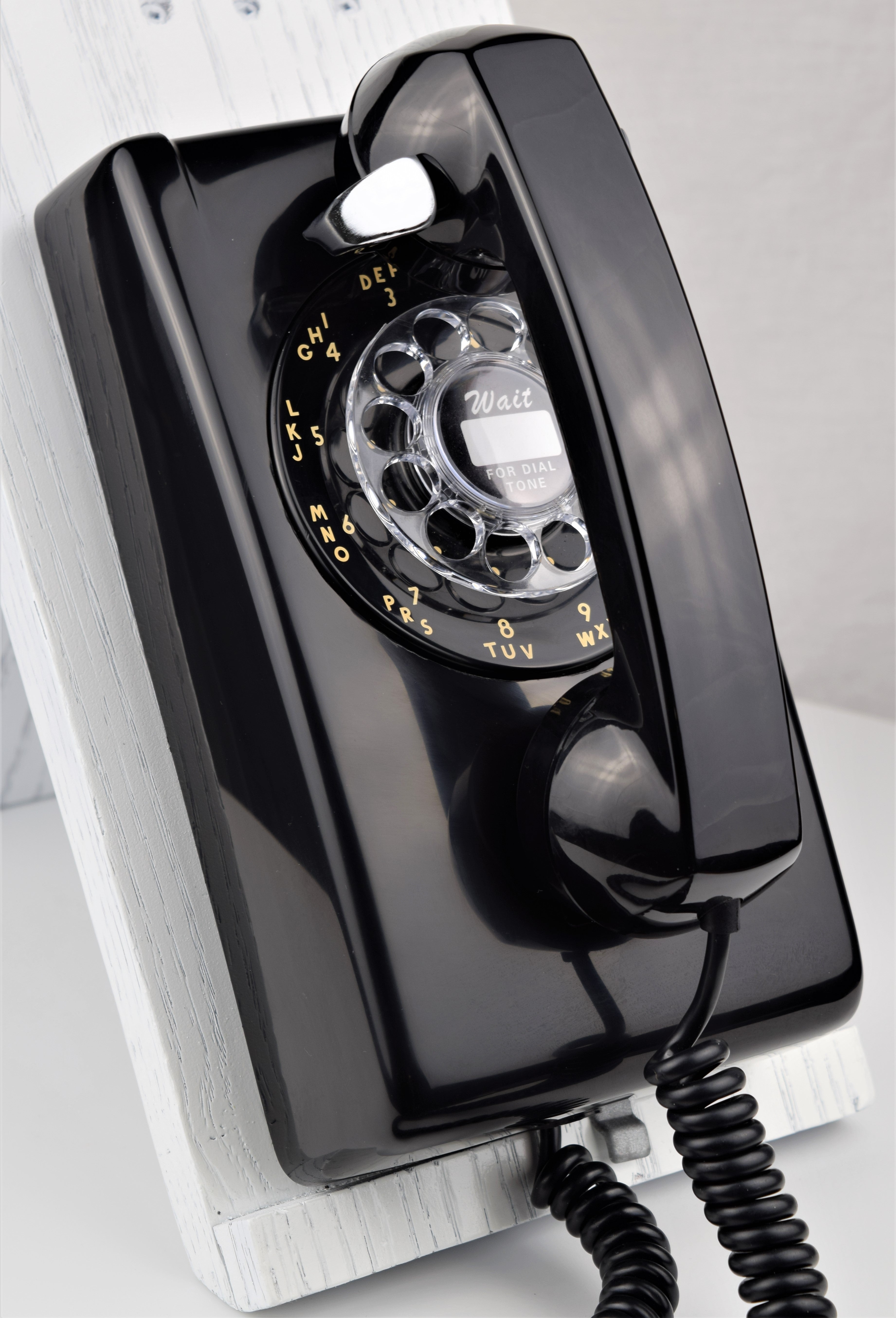 Offers Vintage black rotary dial wall phone telephone