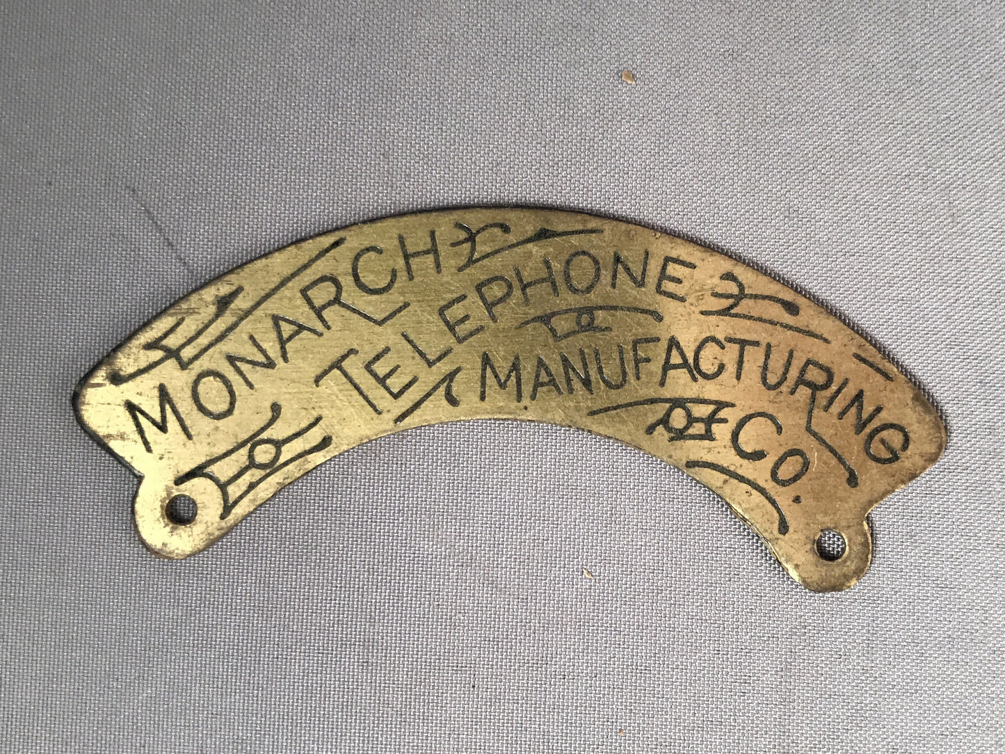 Brass Badge - Monarch Telephone